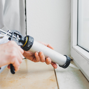 6 Tips for Winterizing Your Home Caulking window