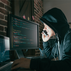 How to Recover from Identity Theft Identity thief hacking into computer